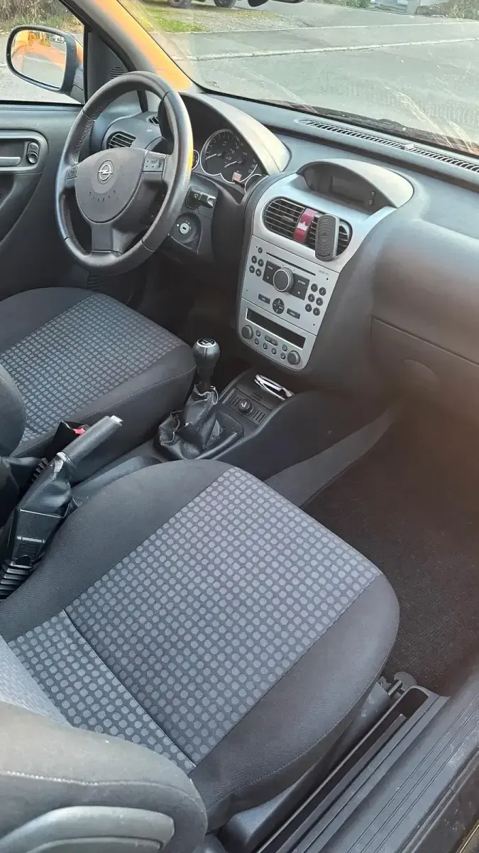 Gebraucht Opel Corsa 60 PS (44 kW) 2011 Schwarz Kleinwagen