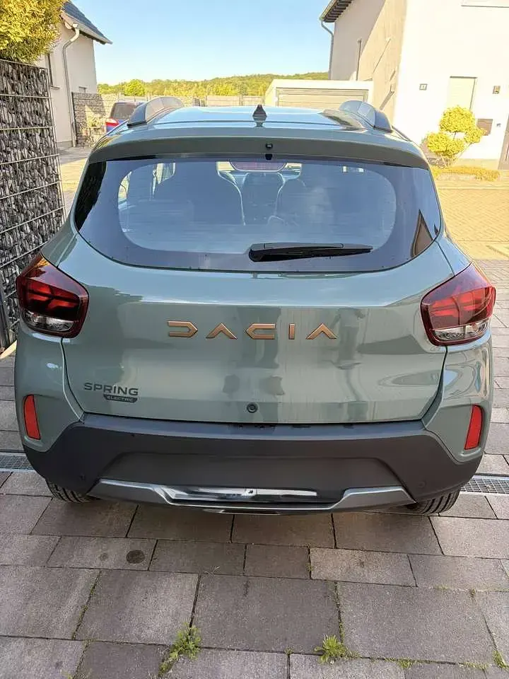 Gebraucht Dacia Spring Extreme 47 kW (65 PS) 2023 Grün Kleinwagen