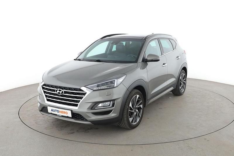 Grau Gebraucht 2019 Hyundai Tucson Premium SUV | 23.590 € (Etwas zu teuer) - Bild 1/3