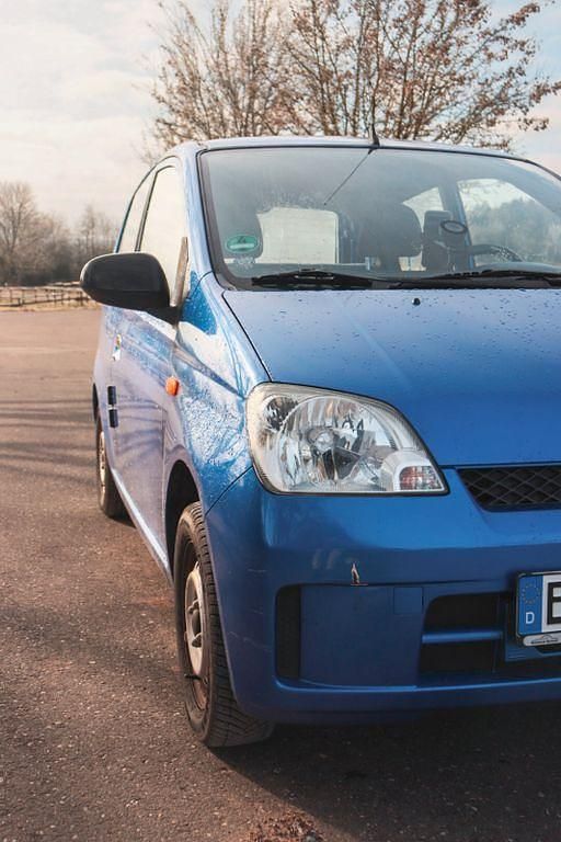 Gebraucht Daihatsu Cuore Plus 58 PS (42 kW) 2003 Blau Kleinwagen