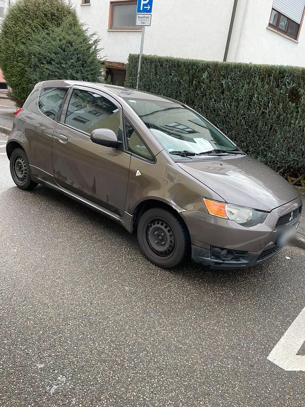Begagnad Mitsubishi Colt 95 HK (69 kW) 2012 Brun Halvkombi