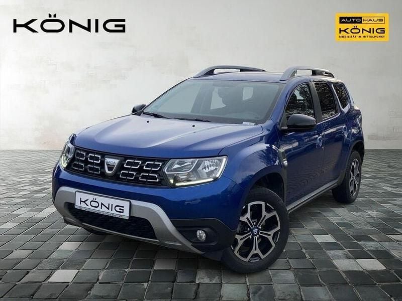 Blau Gebraucht 2021 Dacia Duster Celebration SUV | 14.999 € (Fairer Preis) - Bild 1/4