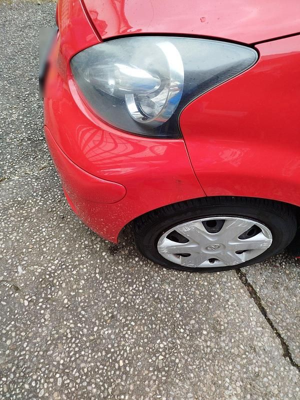 Gebraucht Toyota Aygo 68 PS (50 kW) 2010 Rot Kleinwagen