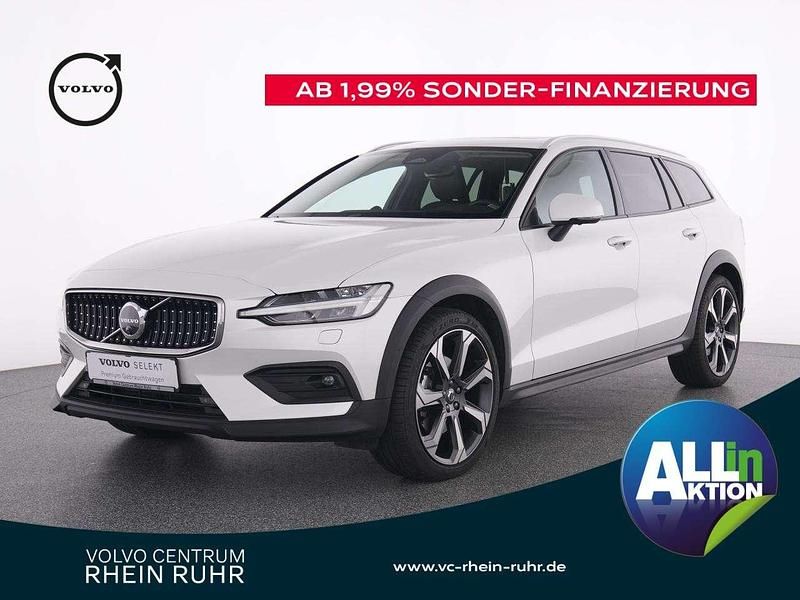 Weiß crystal white pearl / met Gebraucht 2024 Volvo V60 CC Ultimate Kombi | 56.450 € - Bild 1/2