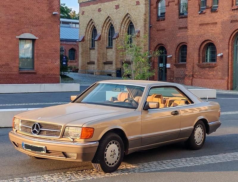 Gold Gebraucht 1986 Mercedes 500 Coupé | 23.900 € - Bild 1/4