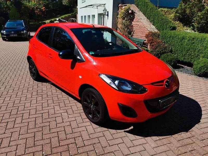 Second-hand Mazda 2 Inclusive 75 CP (55 kW) 2013 Roșu Hatchback