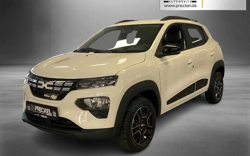 Kaolinweiß Gebraucht 2023 Dacia Spring Essentiel Kleinwagen | 12.470 € (Fairer Preis) - Bild 1/4