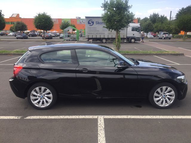 Gebraucht BMW 114 102 PS (75 kW) 2014 Schwarz metallic Kleinwagen