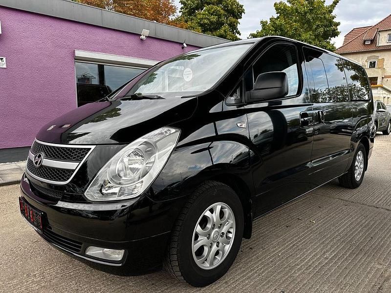 Schwarz Gebraucht 2012 Hyundai H-1 Comfort Van / Kleinbus | 13.990 € (Fairer Preis) - Bild 1/4