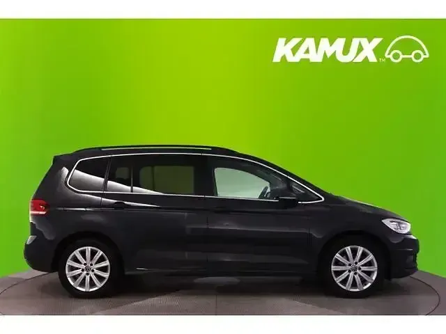 Second-hand VW Touran Highline 150 CP (110 kW) 2023 Gri Monovolum
