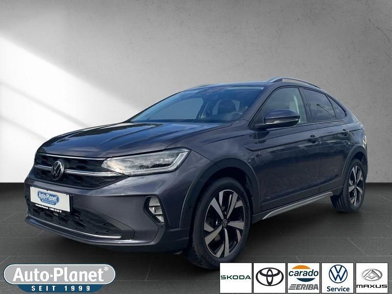 Rauchgrau metallic (metallic) Gebraucht 2024 VW Taigo Style SUV | 22.990 € (Fairer Preis) - Bild 1/4