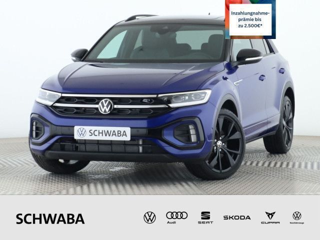 Lapiz blue metallic schwarz Gebraucht 2024 VW T-Roc R-line SUV | 39.490 € - Bild 1/4