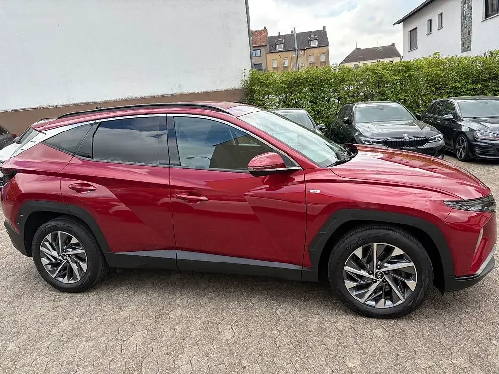 Gebraucht Hyundai Tucson 136 PS (100 kW) 2021 Sunset red SUV
