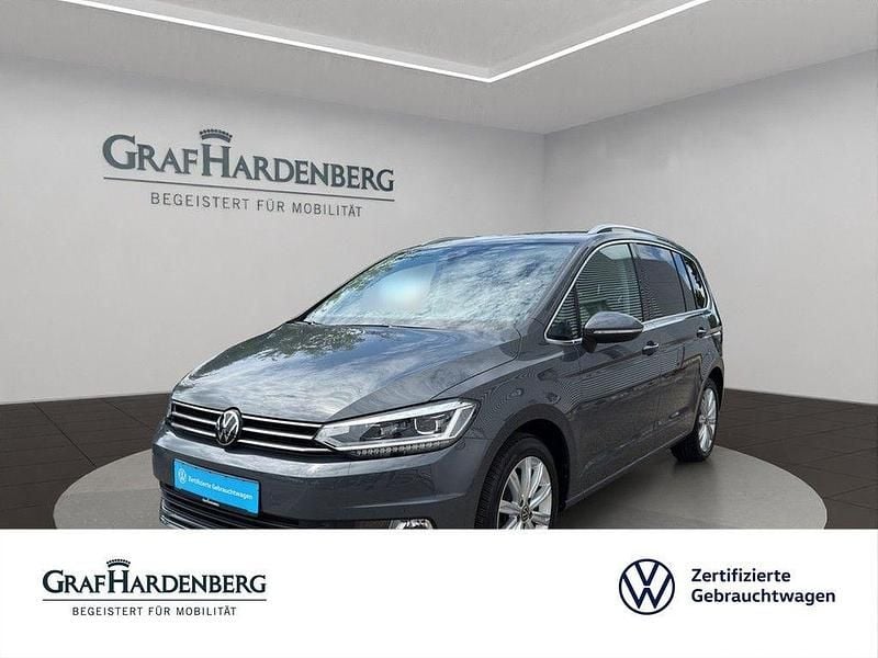 Grau Gebraucht 2024 VW Touran Highline Van / Kleinbus | 36.666 € (Fairer Preis) - Bild 1/4