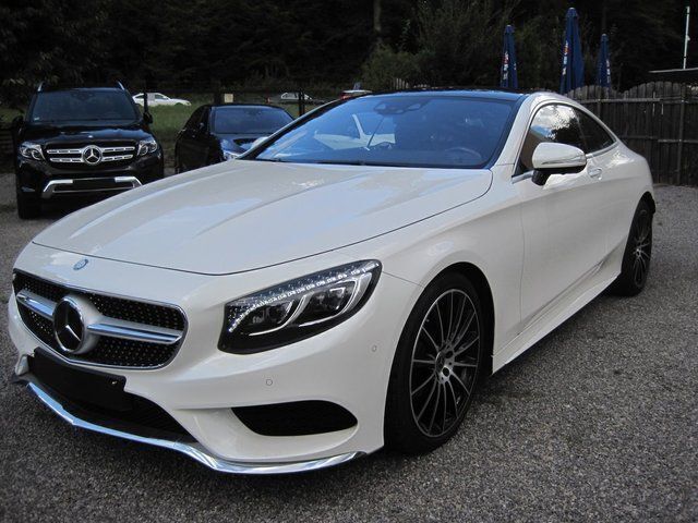 Weiß metallic Gebraucht 2016 Mercedes S63 AMG AMG Coupé | 111.900 € - Bild 1/4