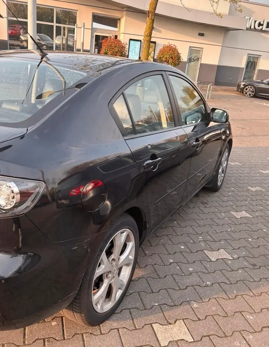 Second-hand Mazda 3 105 CP (77 kW) 2009 Negru Berlinǎ