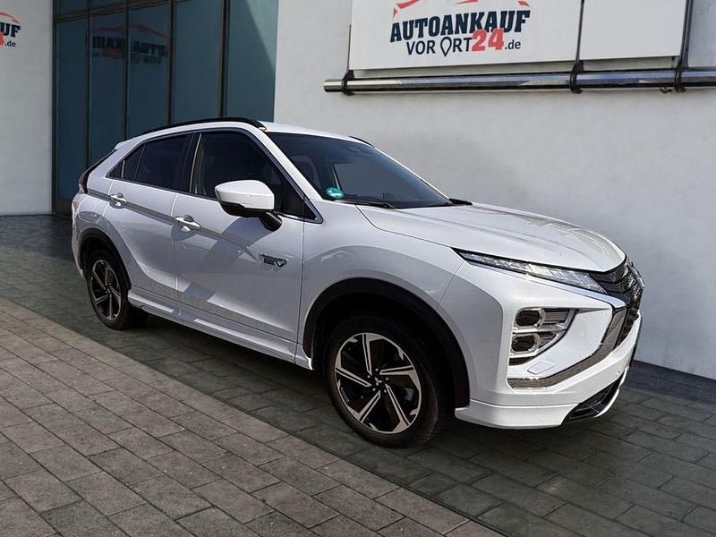 Titanweis (weiß) Gebraucht 2024 Mitsubishi Eclipse Cross Plus SUV | 26.480 € (Fairer Preis) - Bild 1/4