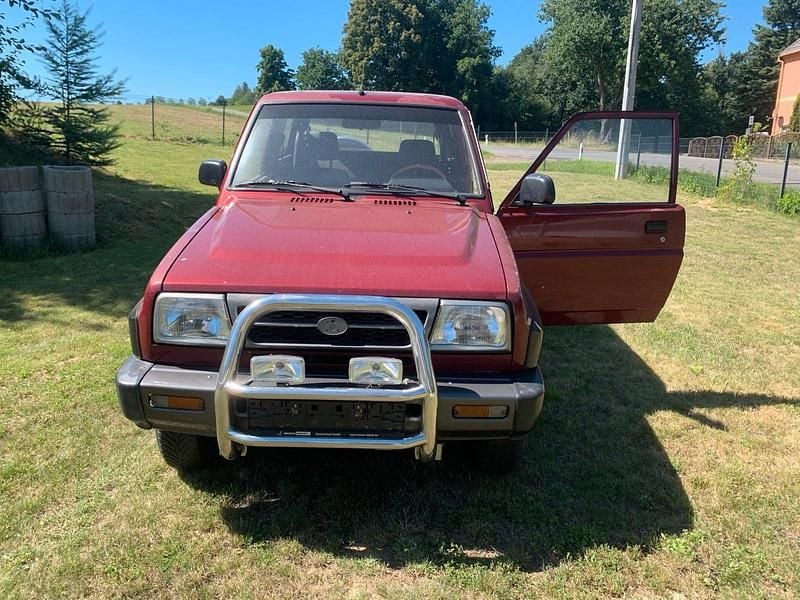 Rot Gebraucht 1996 Daihatsu Rocky SUV | 2.250 € - Bild 1/4