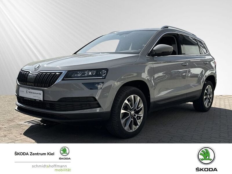 Stahlgrau Gebraucht 2021 Skoda Karoq Clever SUV | 23.980 € (Superpreis) - Bild 1/4