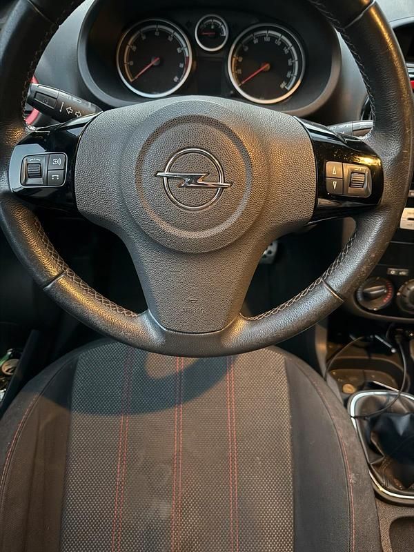 Gebraucht Opel Corsa 81 PS (59 kW) 2010 Schwarz Kleinwagen