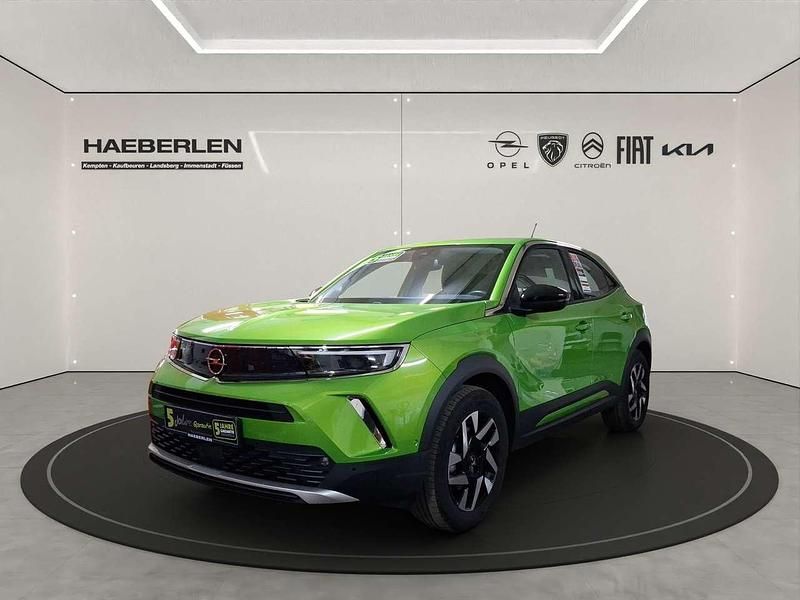 Gebraucht Opel Mokka-e Elegance 100 kW (136 PS) 2022 Matcha green/ikone gruen SUV