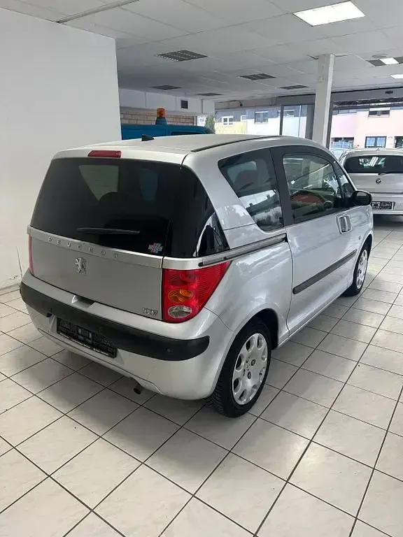 Gebraucht Peugeot 1007 109 PS (80 kW) 2007 Silber Van / Kleinbus