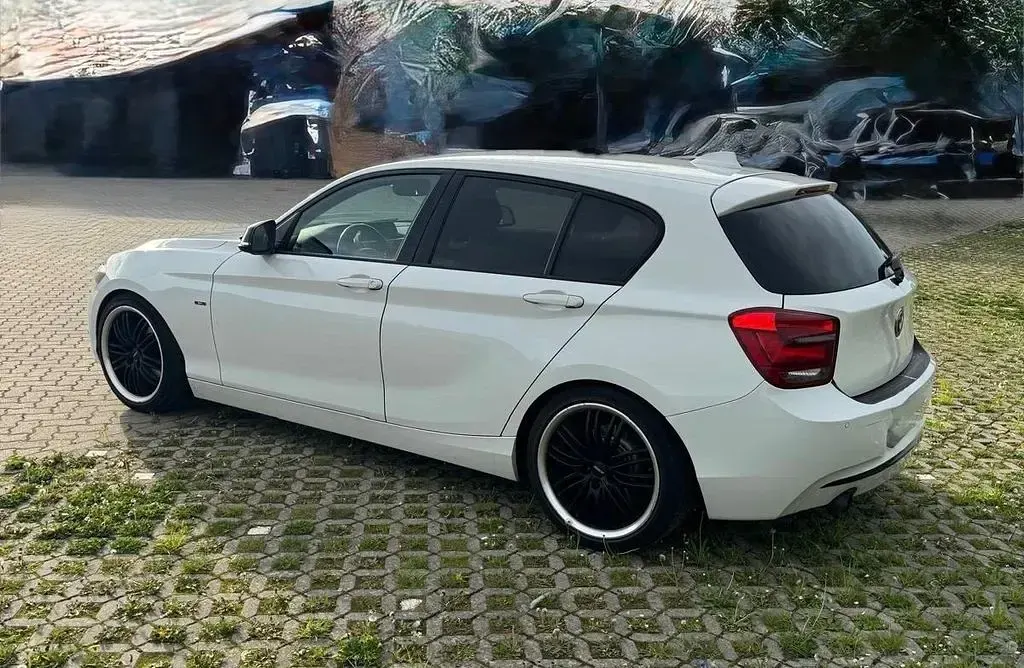 Używany BMW 118 Performance 170 KM (125 kW) 2012 Biały Hatchback