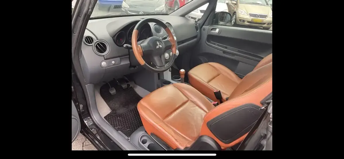 Gebraucht Mitsubishi Colt 109 PS (80 kW) 2009 Schwarz Kleinwagen