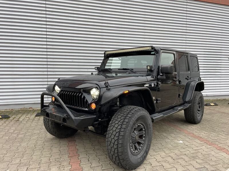 Schwarz Gebraucht 2015 Jeep Wrangler Unlimited Sahara SUV | 22.500 € (Superpreis) - Bild 1/4