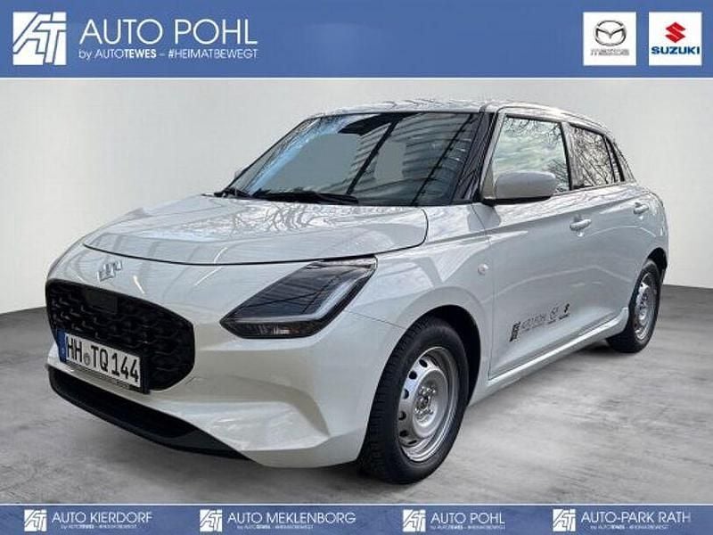 Pure white pearl metallic Gebraucht 2024 Suzuki Swift Comfort Kleinwagen | 15.990 € (Fairer Preis) - Bild 1/4