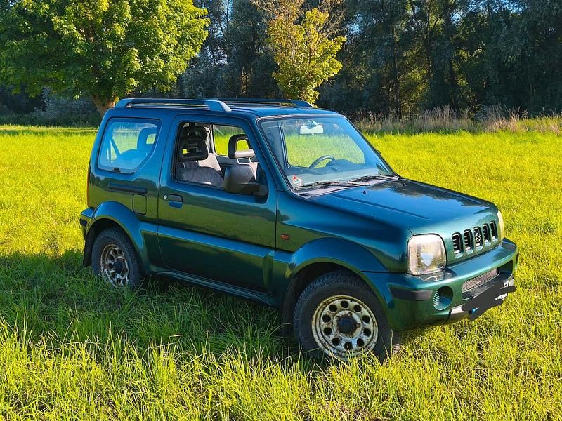 Grün Gebraucht 1999 Suzuki Jimny SUV | 3.900 € (Fairer Preis) - Bild 1/4