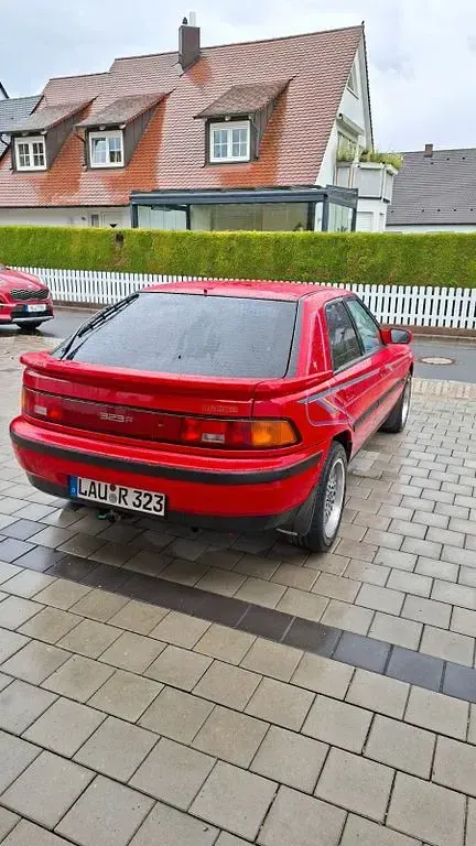 Gebraucht Mazda 323F 88 PS (64 kW) 1991 Rot Limousine