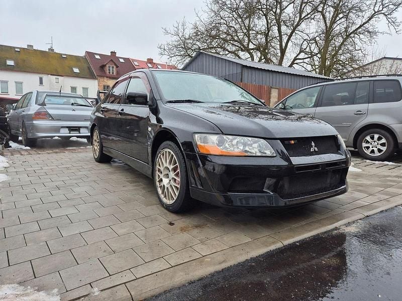 Second-hand Mitsubishi Lancer Evolution 280 CP (205 kW) 2001 Negru Berlinǎ
