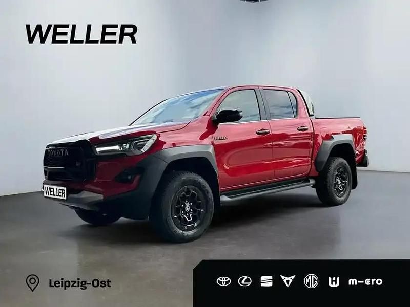Tornadorot metallic Neu 2025 Toyota HiLux Abholung | 64.990 € (Teuer) - Bild 1/3