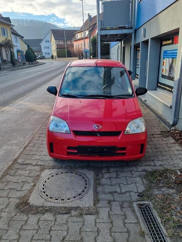 Gebraucht Daihatsu Cuore 58 PS (42 kW) 2005 Rot Kleinwagen