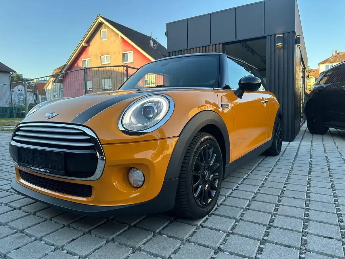 Gebraucht Mini Cooper D Chili 116 PS (85 kW) 2015 Orange Kleinwagen