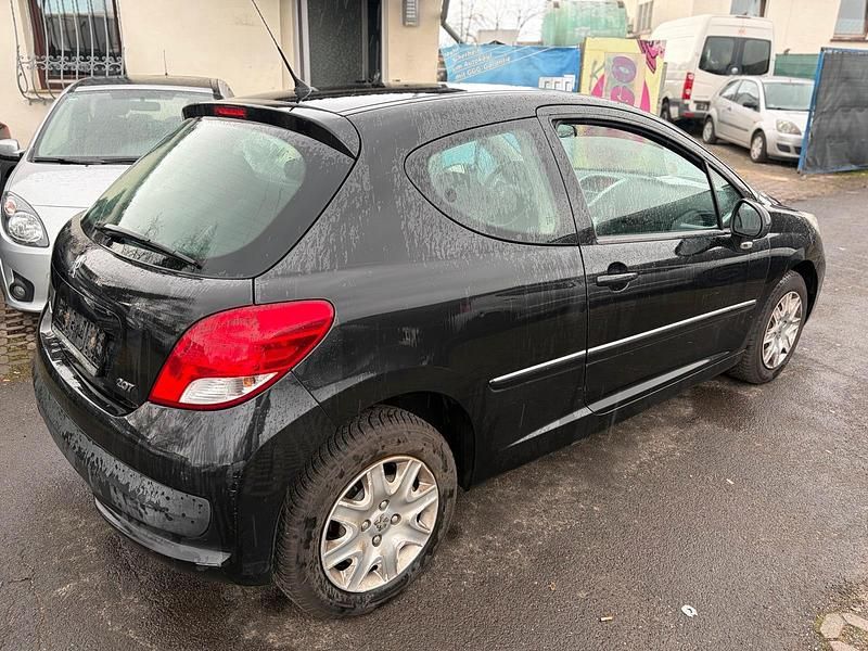 Gebraucht Peugeot 207 73 PS (53 kW) 2011 Schwarz Kleinwagen