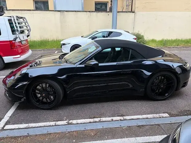 Gebraucht Porsche 911 480 PS (353 kW) 2023 Tiefschwarz (metallic) Cabrio