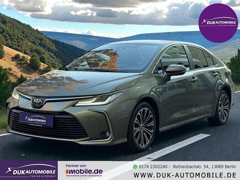 Braun Gebraucht 2020 Toyota Corolla Hybrid Club Limousine | 17.999 € (Fairer Preis) - Bild 1/4