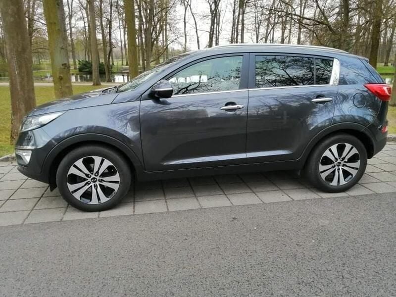 Grau Gebraucht 2012 Kia Sportage SUV | 8.999 € - Bild 1/4