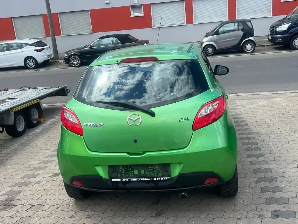 Używany Mazda 2 Dynamic 86 KM (63 kW) 2009 Zielony Hatchback