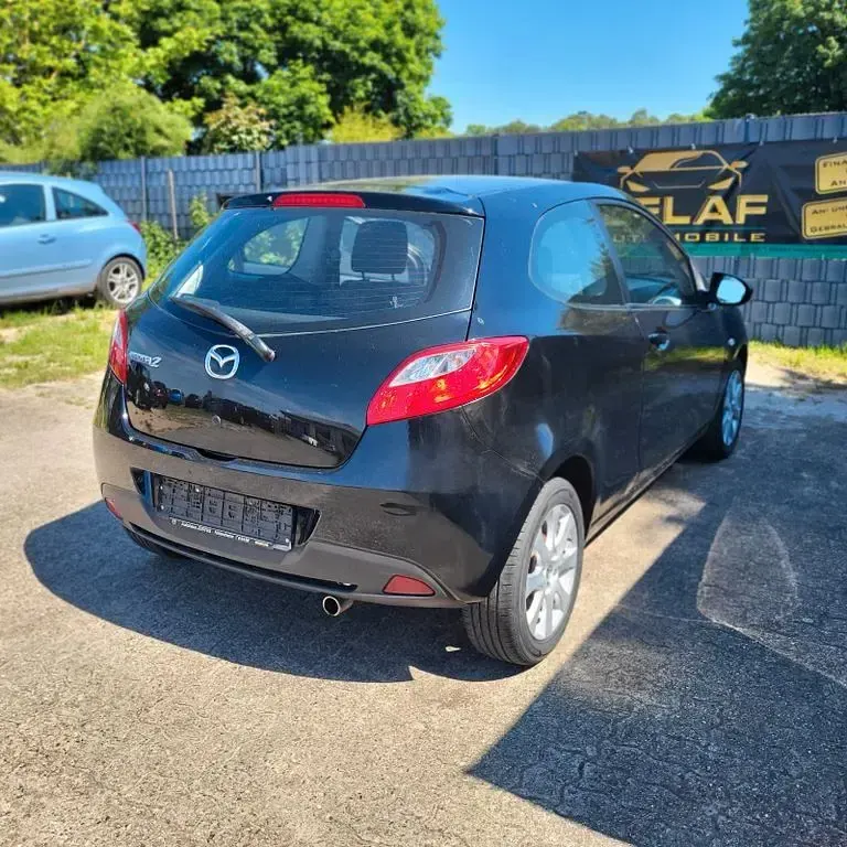 Gebraucht Mazda 2 Inclusive 75 PS (55 kW) 2010 Schwarz Kleinwagen