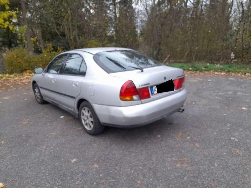 Gebraucht Mitsubishi Carisma 125 PS (91 kW) 1998 Limousine