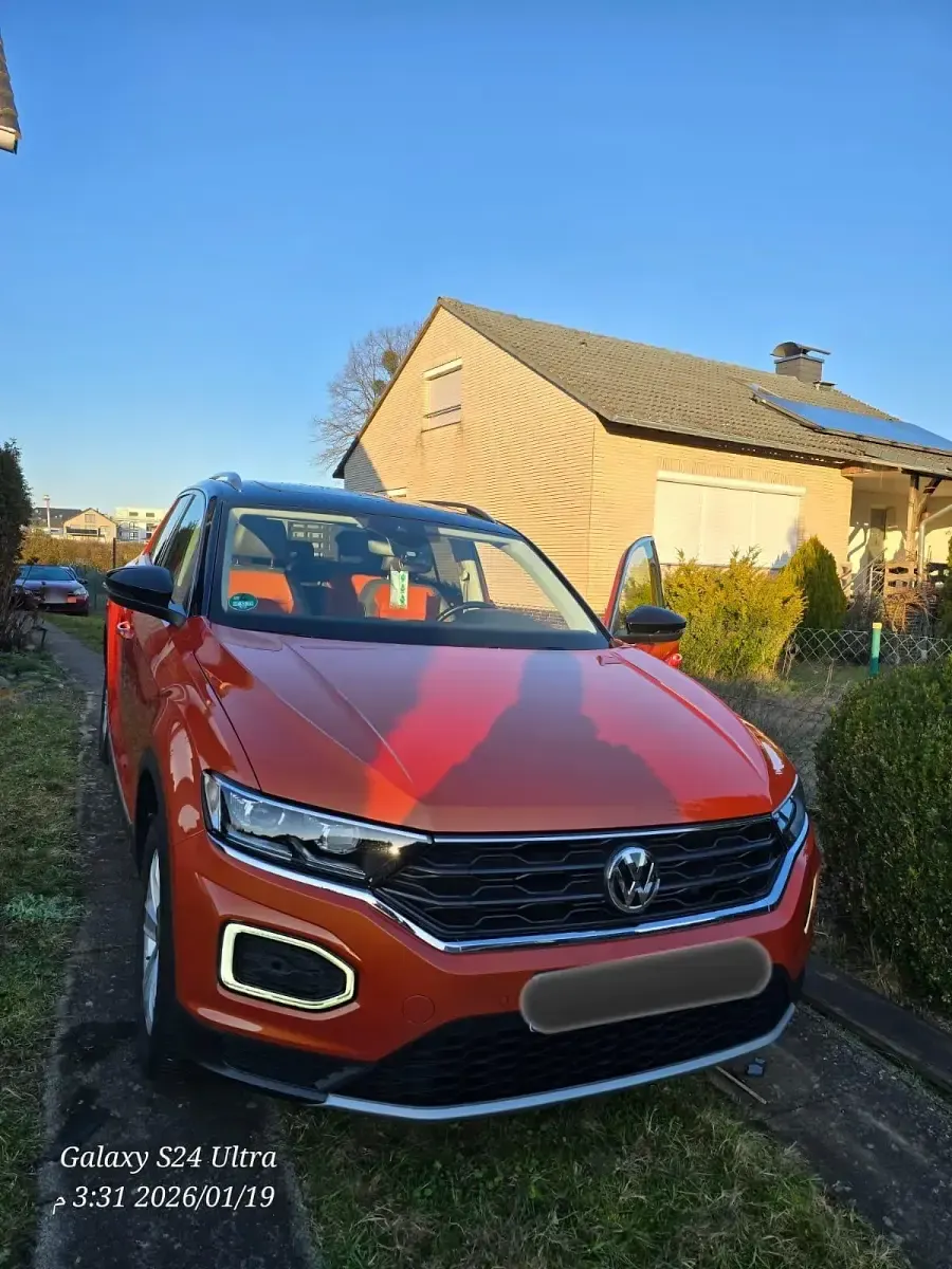 Second-hand VW T-Roc 116 CP (85 kW) 2018 Portocaliu SUV