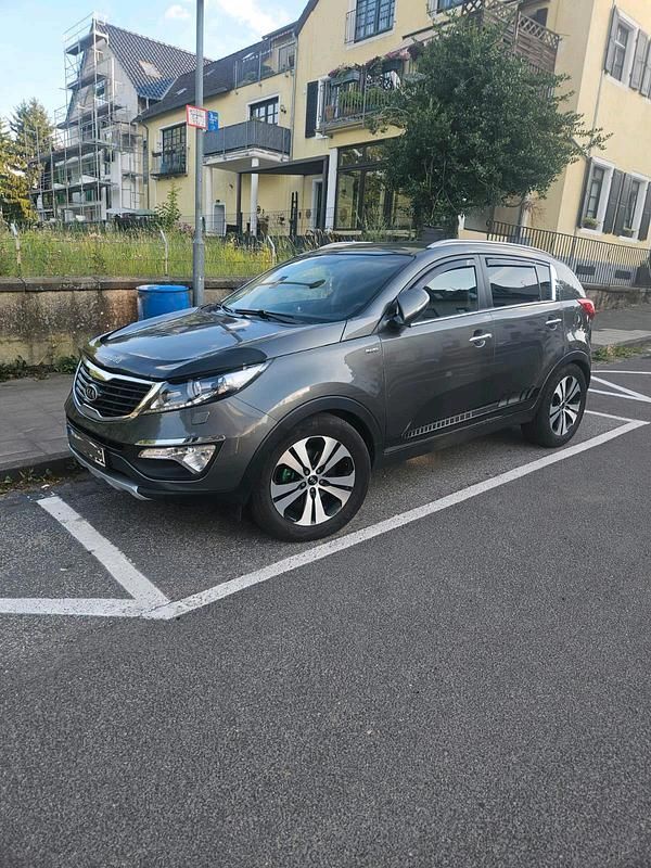 Grau Gebraucht 2012 Kia Sportage SUV | 9.500 € (Etwas zu teuer) - Bild 1/4