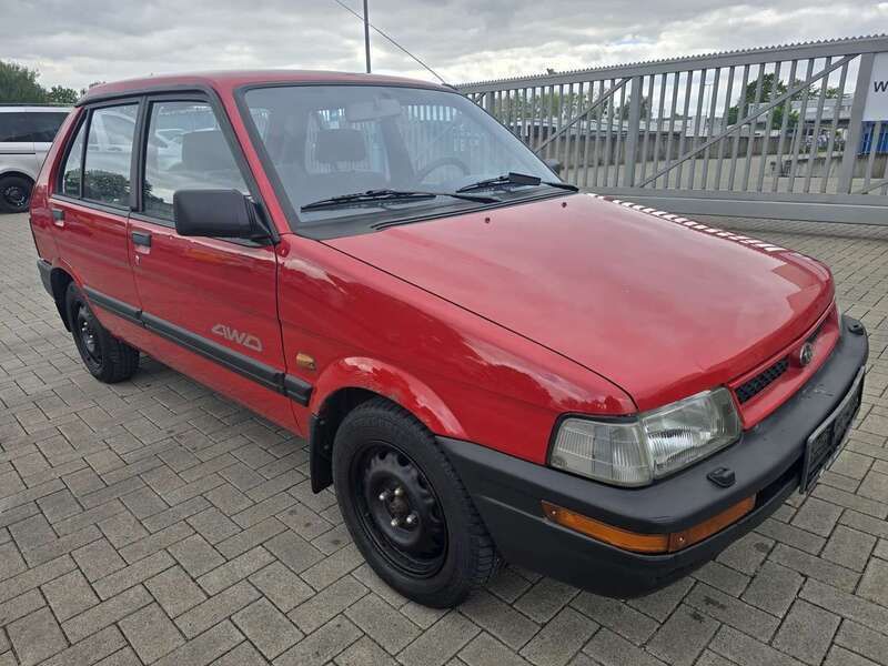 Rot Gebraucht 1991 Subaru Justy Kleinwagen | 2.450 € - Bild 1/4
