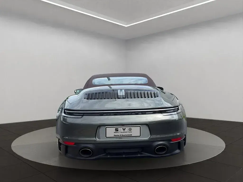 Gebraucht Porsche 992 480 PS (353 kW) 2022 Aventuringrün Cabrio