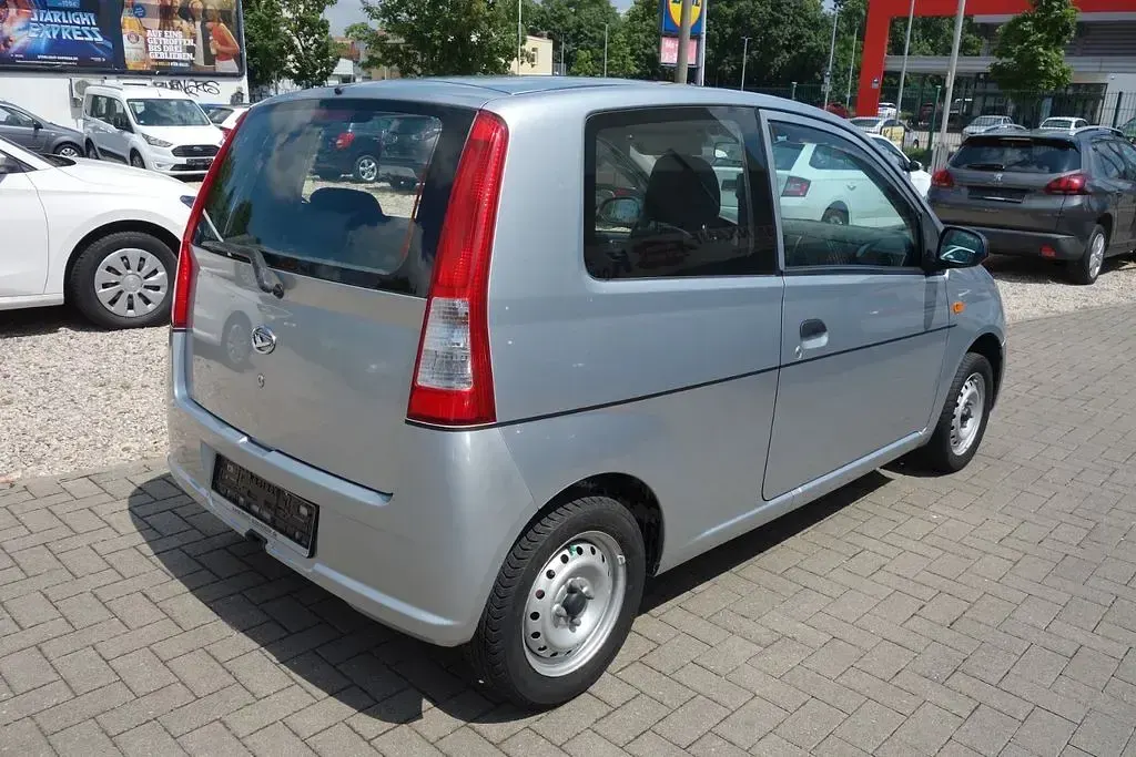 Gebraucht Daihatsu Cuore Plus 58 PS (42 kW) 2006 Silber Kleinwagen