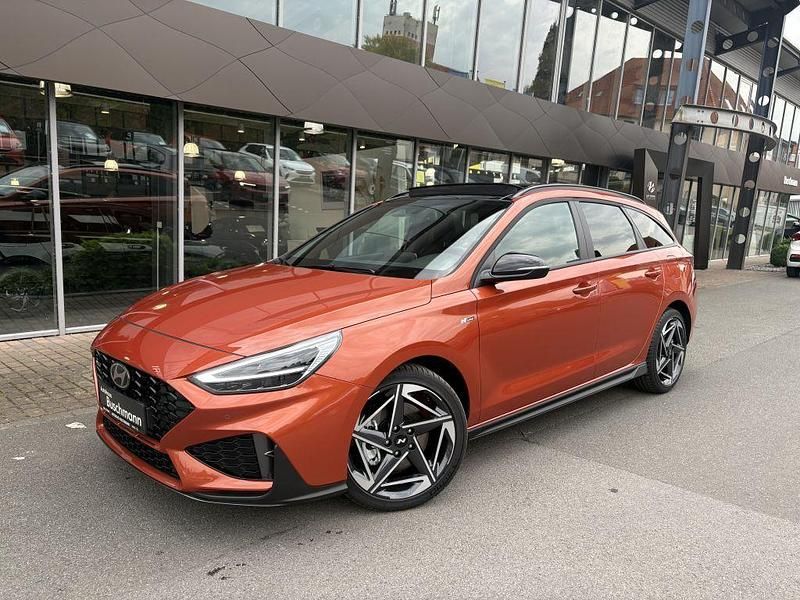 Jupiter orange metallic Neu 2025 Hyundai i30 N Line Kombi | 32.270 € (Teuer) - Bild 1/4