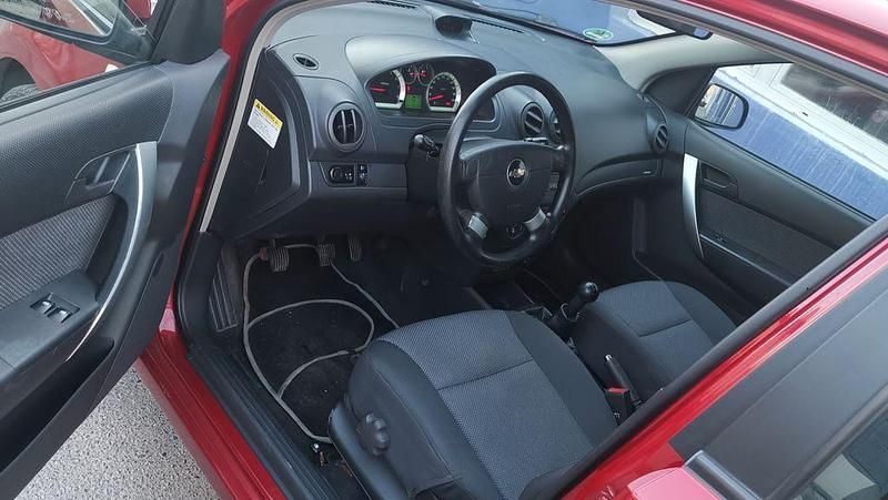 Gebraucht Chevrolet Aveo 84 PS (61 kW) 2011 Rot Limousine